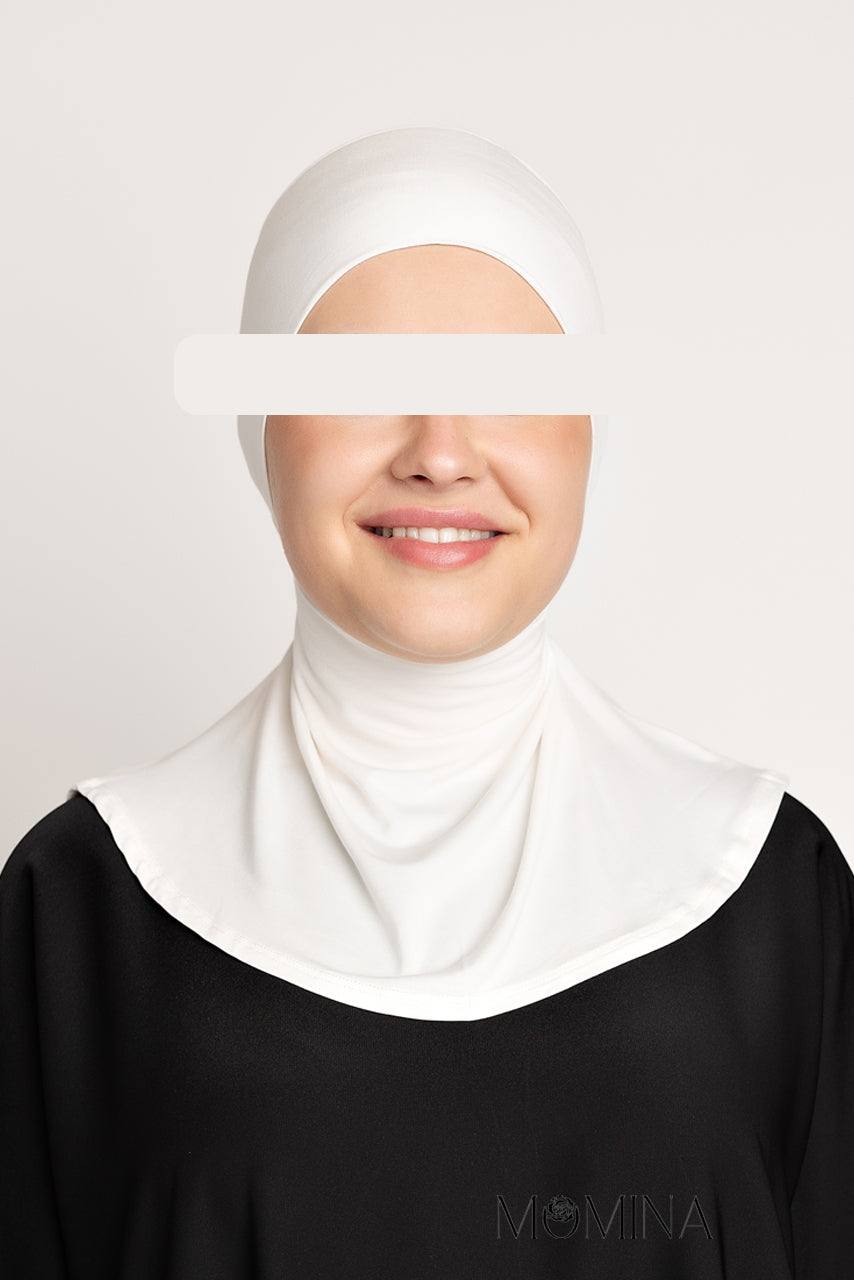 A hijabi model wearing a white full coverage ninja undercap from momina hijabs