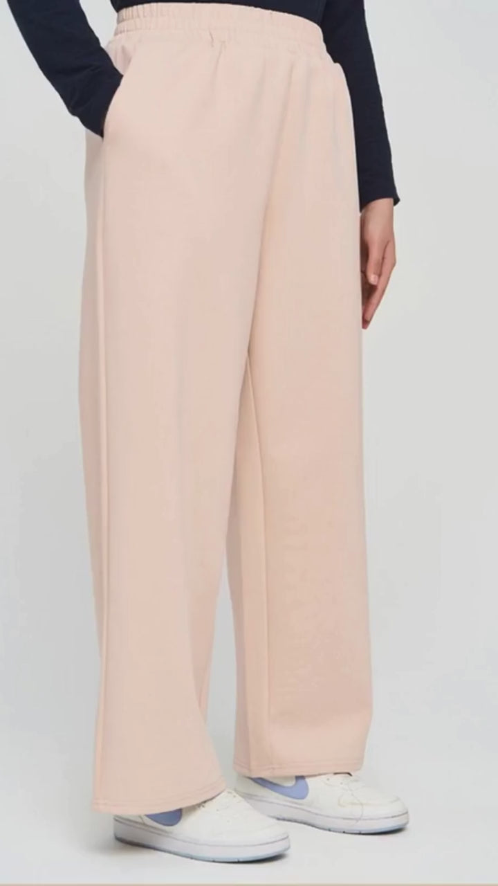 A close up of the Raha Wide Leg Pants in Vanilla by Momina Hijabs