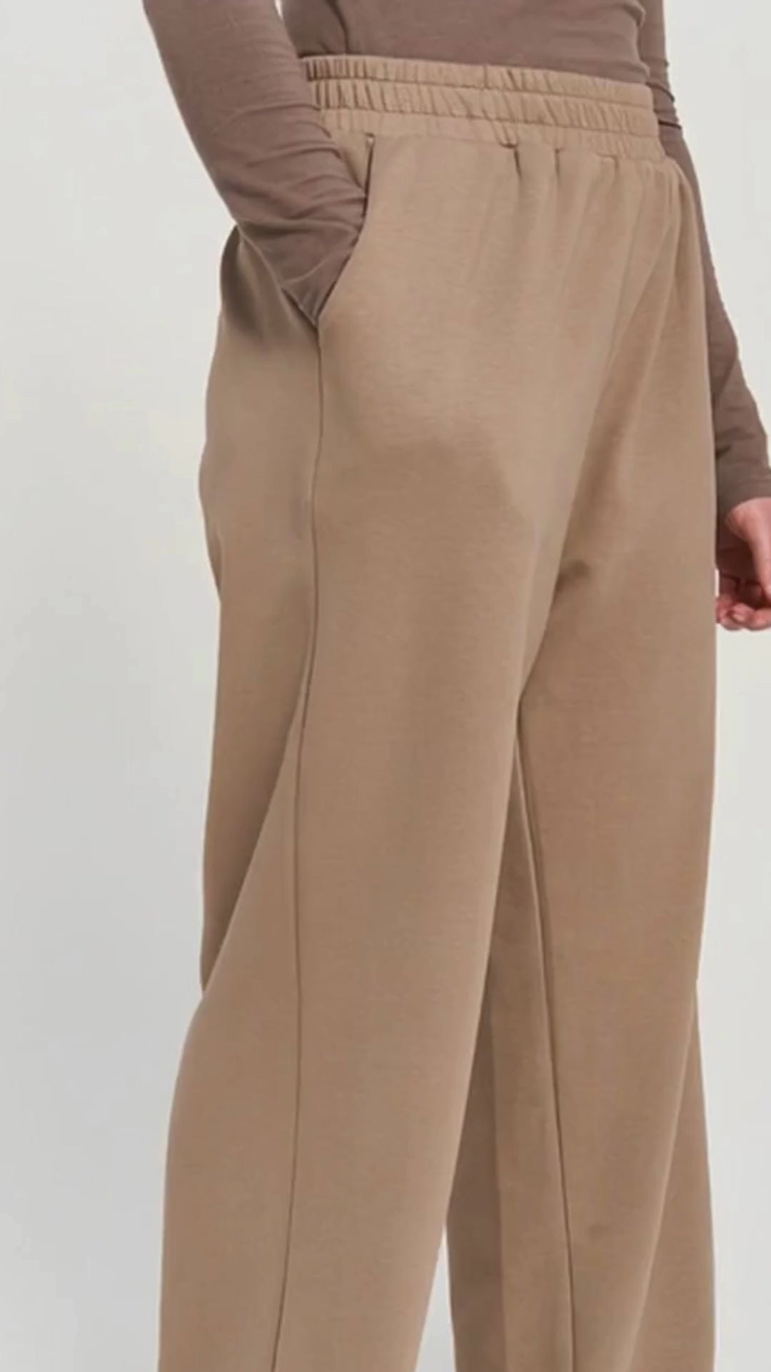 Model wearing the Raha Wide Leg Pant Latte by Momina Hijabs