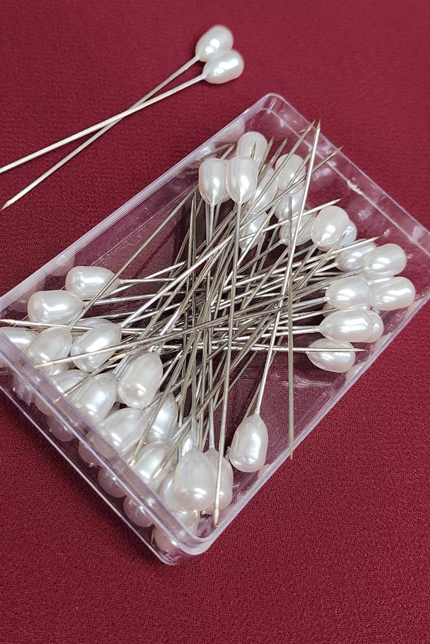 A box of 30 straight hijab pins by Momina Hijabs.